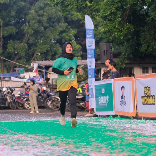 Race photo from BAUR RUN 2025