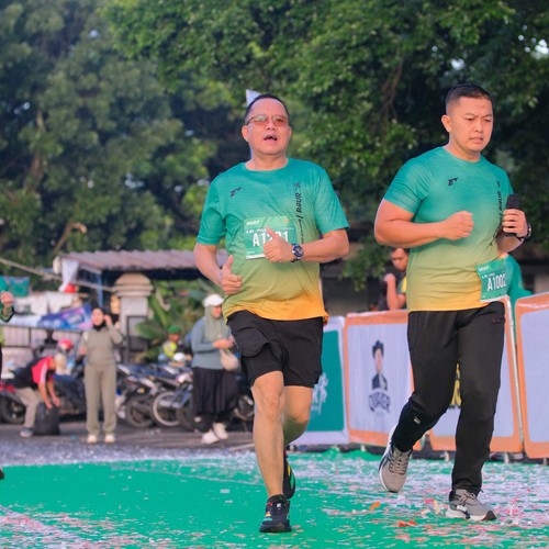 Race photo from BAUR RUN 2025