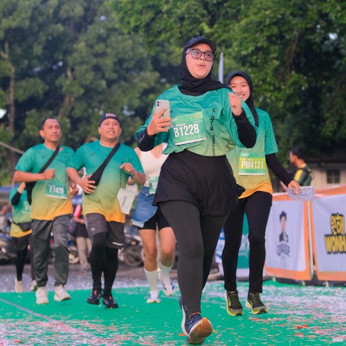 Race photo from BAUR RUN 2025