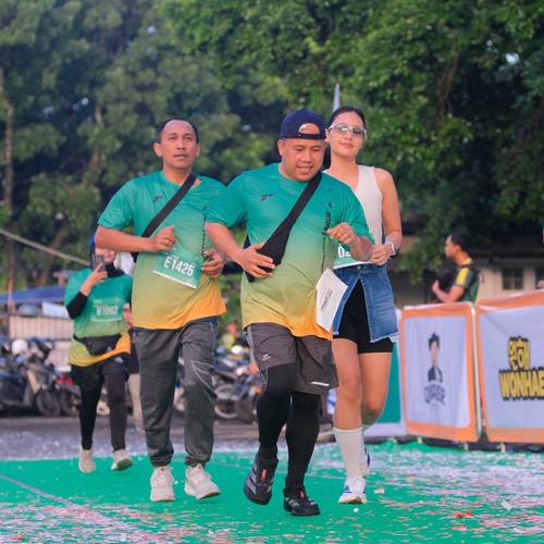 Race photo from BAUR RUN 2025