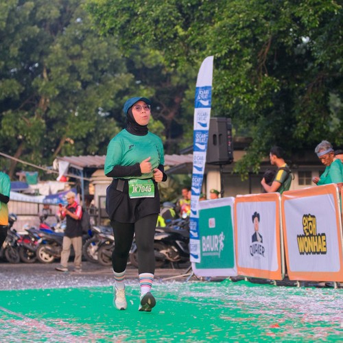 Race photo from BAUR RUN 2025