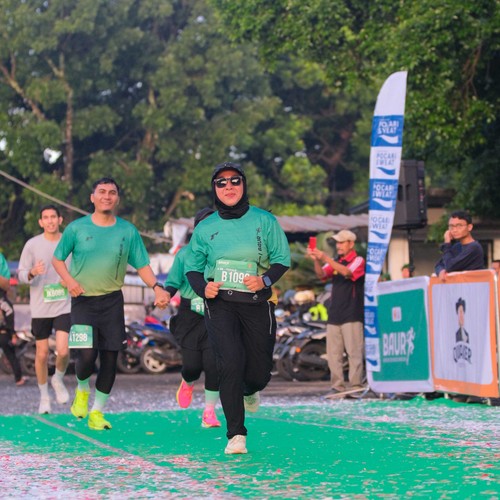 Race photo from BAUR RUN 2025