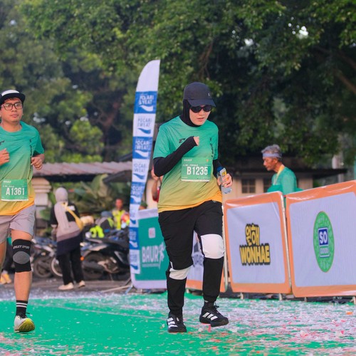 Race photo from BAUR RUN 2025