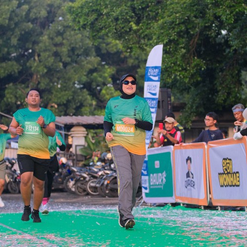 Race photo from BAUR RUN 2025