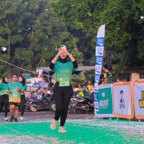 Race photo from BAUR RUN 2025