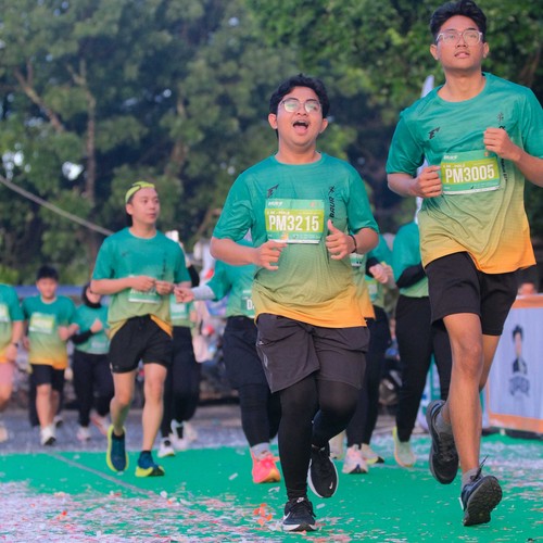 Race photo from BAUR RUN 2025