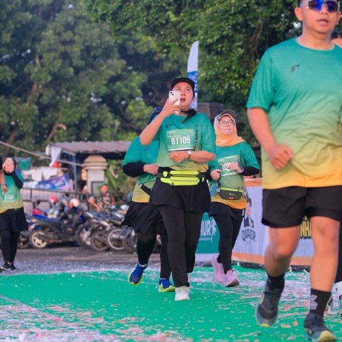 Race photo from BAUR RUN 2025
