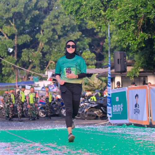 Race photo from BAUR RUN 2025