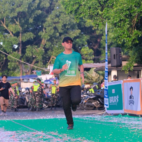 Race photo from BAUR RUN 2025