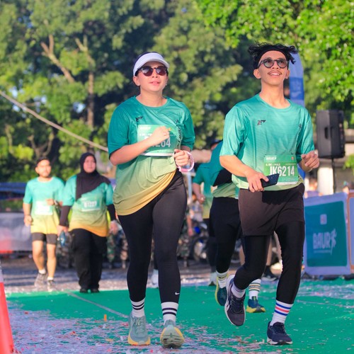 Race photo from BAUR RUN 2025