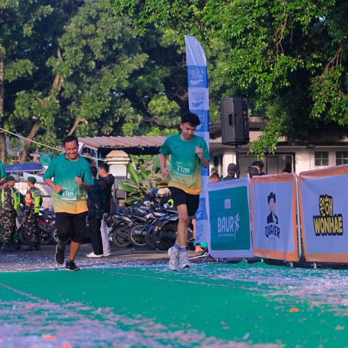 Race photo from BAUR RUN 2025