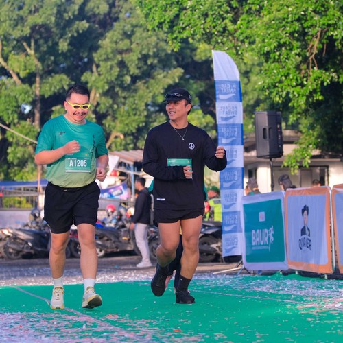 Race photo from BAUR RUN 2025