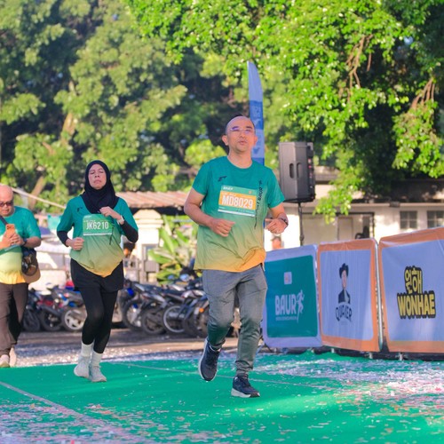 Race photo from BAUR RUN 2025
