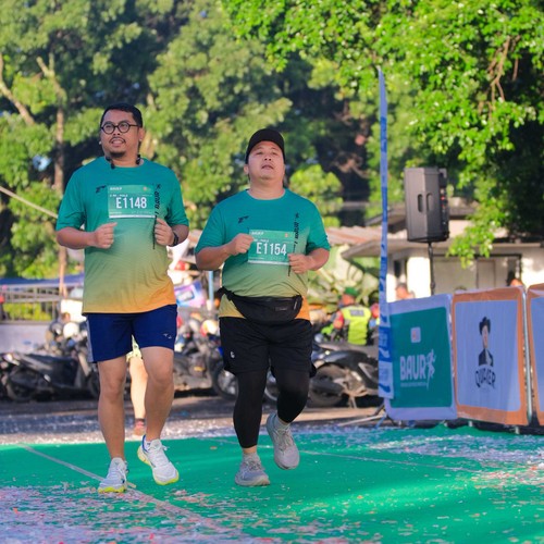 Race photo from BAUR RUN 2025