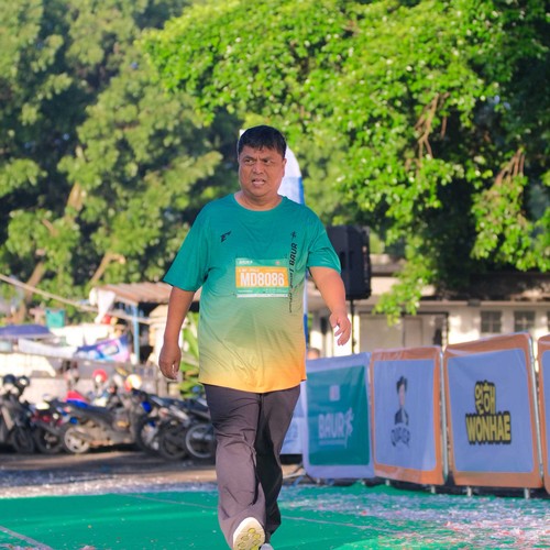 Race photo from BAUR RUN 2025