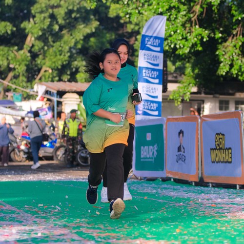 Race photo from BAUR RUN 2025