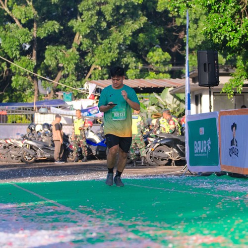 Race photo from BAUR RUN 2025