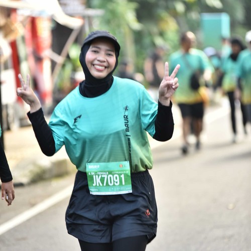 Race photo from BAUR RUN 2025