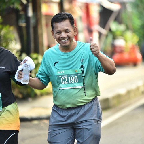 Race photo from BAUR RUN 2025