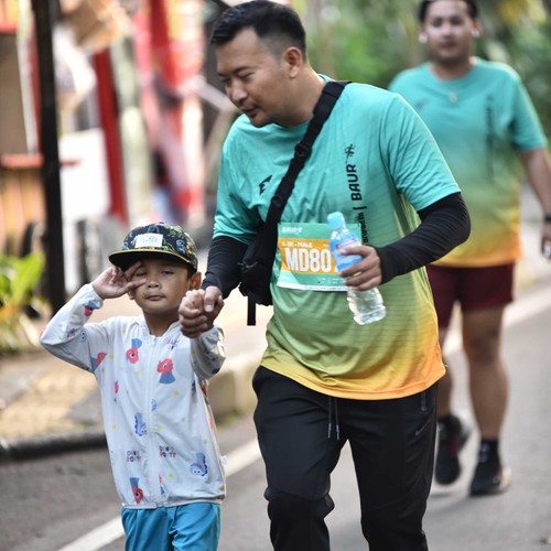 Race photo from BAUR RUN 2025