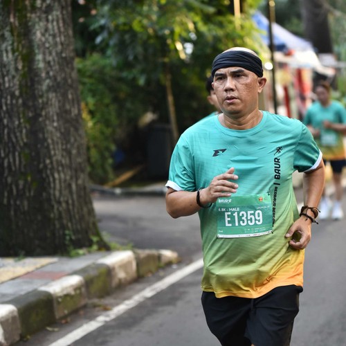 Race photo from BAUR RUN 2025