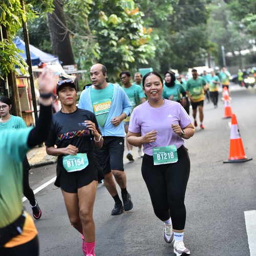 Race photo from BAUR RUN 2025