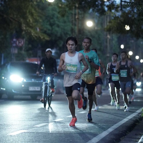 Race photo from BAUR RUN 2025