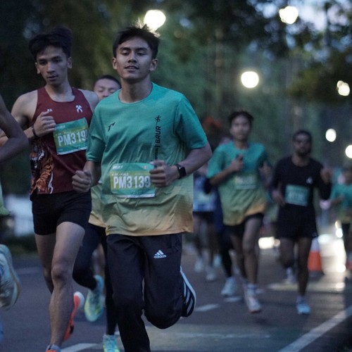 Race photo from BAUR RUN 2025