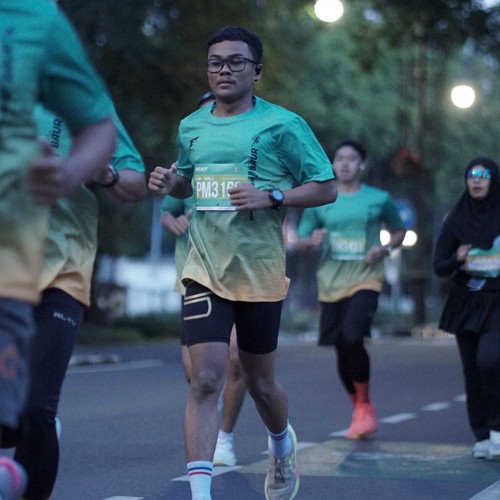 Race photo from BAUR RUN 2025