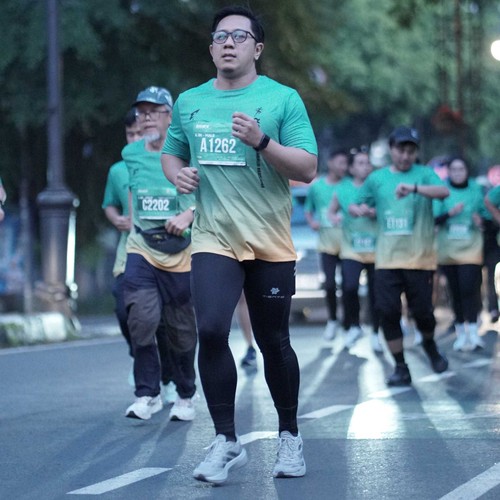 Race photo from BAUR RUN 2025