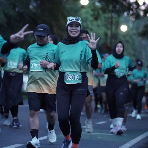 Race photo from BAUR RUN 2025
