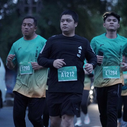 Race photo from BAUR RUN 2025