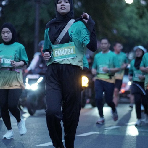 Race photo from BAUR RUN 2025