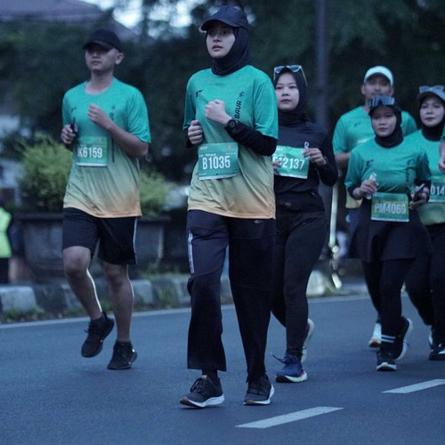 Race photo from BAUR RUN 2025