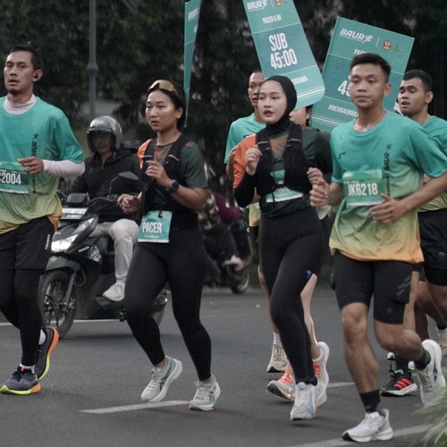Race photo from BAUR RUN 2025