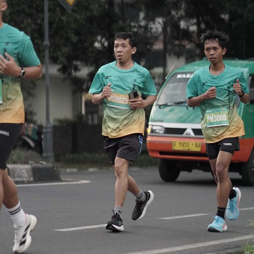 Race photo from BAUR RUN 2025