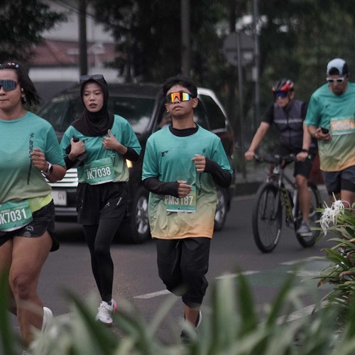 Race photo from BAUR RUN 2025