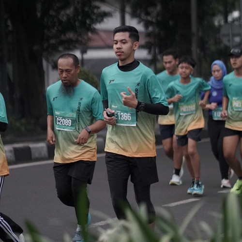 Race photo from BAUR RUN 2025
