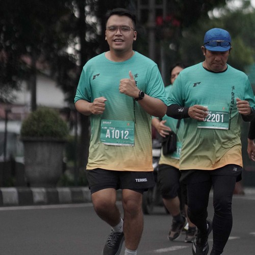 Race photo from BAUR RUN 2025