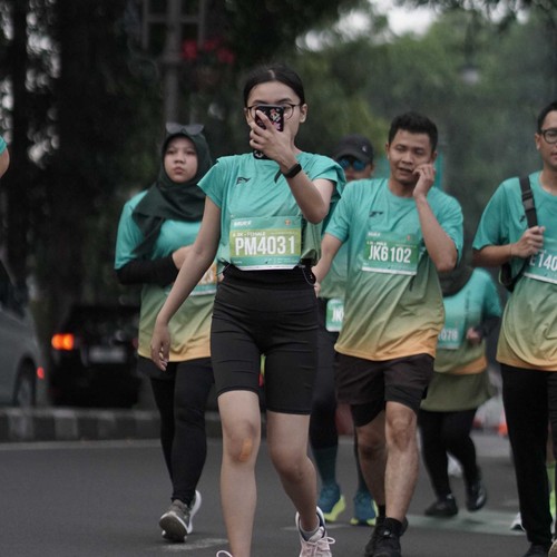 Race photo from BAUR RUN 2025