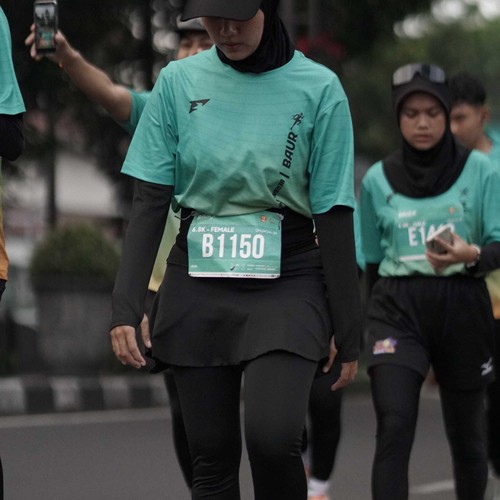 Race photo from BAUR RUN 2025