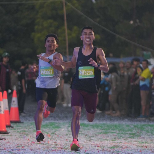 Race photo from BAUR RUN 2025