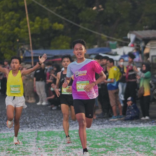 Race photo from BAUR RUN 2025