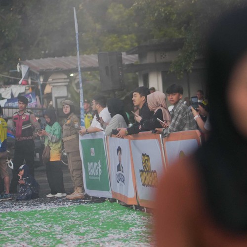 Race photo from BAUR RUN 2025