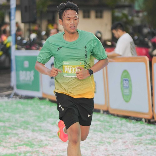 Race photo from BAUR RUN 2025