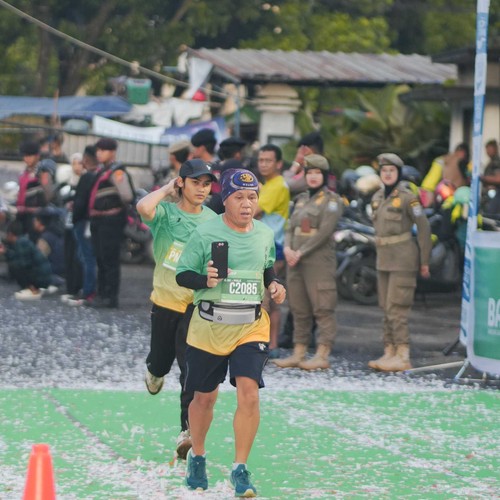 Race photo from BAUR RUN 2025