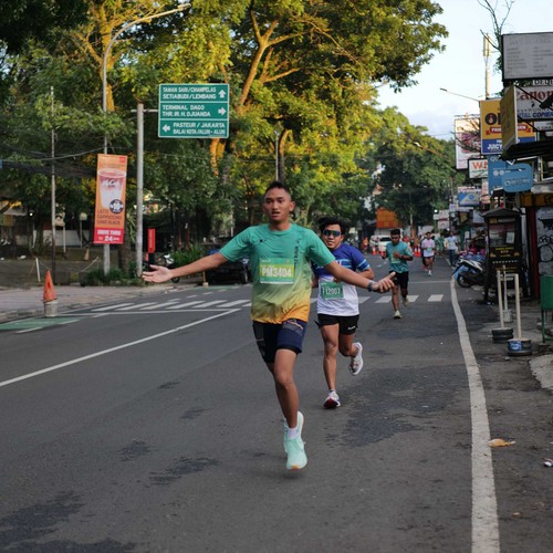 Race photo from BAUR RUN 2025