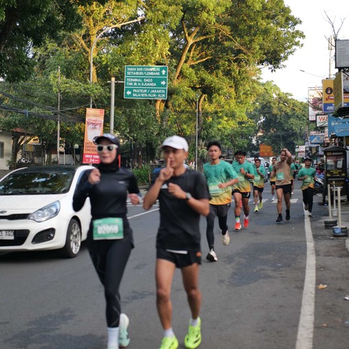 Race photo from BAUR RUN 2025
