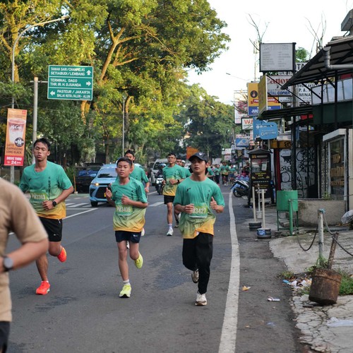 Race photo from BAUR RUN 2025