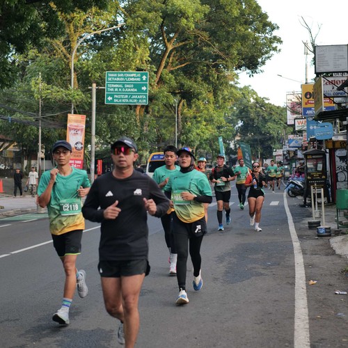 Race photo from BAUR RUN 2025